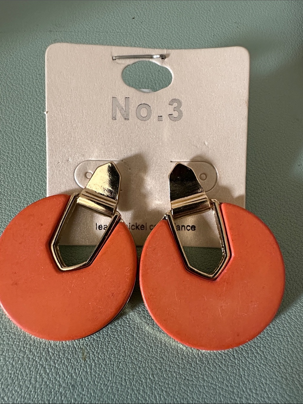 Orange Round Drop Earrings with Gold Accents